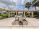Spacious screened lanai overlooking the golf course and lake at 424 Cardiff Rd # 27, Venice, FL 34293