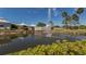 Relaxing pool area with fountain and lush landscaping at 424 Cardiff Rd # 27, Venice, FL 34293
