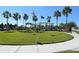 Gated community entrance with landscaping and playground at 11415 52Nd E Ct, Parrish, FL 34219