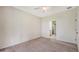 Carpeted bedroom with an ensuite bathroom access at 11415 52Nd E Ct, Parrish, FL 34219