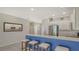 Modern kitchen with stainless steel appliances and a breakfast bar at 11415 52Nd E Ct, Parrish, FL 34219