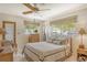 Spacious bedroom with a queen-size bed and access to the outdoors at 3225 Duncan Way, Sarasota, FL 34239
