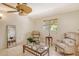 Comfortable sitting area with two armchairs and a coffee table at 3225 Duncan Way, Sarasota, FL 34239