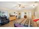 Bright bedroom with a king-size bed and access to another room at 907 E Rosedale Rd, Venice, FL 34293