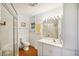 Clean bathroom with a shower/tub combo, vanity, and tiled floor at 907 E Rosedale Rd, Venice, FL 34293