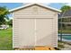 Ample storage shed with double doors at 907 E Rosedale Rd, Venice, FL 34293