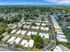 Aerial view showing a home nestled in a quiet neighborhood at 2323 Waterbluff Pl # V314, Sarasota, FL 34231
