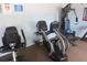 Fitness room with recumbent bike and weight machine at 2323 Waterbluff Pl # V314, Sarasota, FL 34231