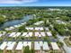 Wide aerial view of the home and surroundings at 2323 Waterbluff Pl # V314, Sarasota, FL 34231