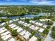 Aerial view of a home situated near a canal, offering waterfront access at 2323 Waterbluff Pl # V314, Sarasota, FL 34231