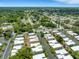 Aerial view showcasing a single-Gathering home in a community of similar homes at 2323 Waterbluff Pl # V314, Sarasota, FL 34231