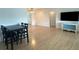 Living room with dining area and wood floors at 2501 Beneva Rd # 8, Sarasota, FL 34232