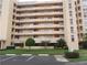 Exterior view of a light beige multi-story building at 4410 Fairways Blvd # 602, Bradenton, FL 34209