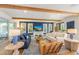Spacious living room featuring hardwood floors and comfortable sofas at 108 Tern Dr, Anna Maria, FL 34216