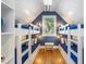 Unique bunk room with built-in bunks and nautical theme at 108 Tern Dr, Anna Maria, FL 34216