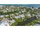Aerial view of house and neighborhood near the ocean at 108 Tern Dr, Anna Maria, FL 34216