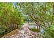 Private wooden dock offering serene waterfront access at 108 Tern Dr, Anna Maria, FL 34216