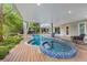 Stunning pool and spa with a covered patio perfect for outdoor entertaining at 108 Tern Dr, Anna Maria, FL 34216