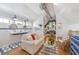 Charming living space with white couch and nautical decor at 108 Tern Dr, Anna Maria, FL 34216