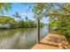 Enjoy direct water access with this private wooden dock at 108 Tern Dr, Anna Maria, FL 34216