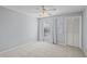 Empty bedroom with a ceiling fan, a window with blinds and a closet at 4714 Elder Berry Dr, Sarasota, FL 34241