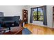Spacious home office with hardwood floors and built-in shelving at 4714 Elder Berry Dr, Sarasota, FL 34241