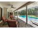 Relaxing pool and spa area with covered patio and seating at 4714 Elder Berry Dr, Sarasota, FL 34241