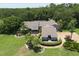 Large home with a spacious backyard and lush landscaping at 4714 Elder Berry Dr, Sarasota, FL 34241