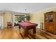 Game room featuring a pool table and hardwood floors at 4714 Elder Berry Dr, Sarasota, FL 34241