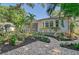 Landscaped backyard with brick pathways and lush plants at 1910 Morris St, Sarasota, FL 34239