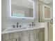 Double vanity bathroom with a walk in shower at 1558 4Th St # 210, Sarasota, FL 34236