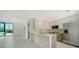 Open concept kitchen, showcasing contemporary cabinets and a breakfast bar at 1558 4Th St # 210, Sarasota, FL 34236