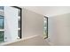 Bright interior hallway with views to courtyard at 1558 4Th St # 210, Sarasota, FL 34236