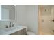 Modern bathroom with a walk-in shower and updated vanity at 1558 4Th St # 210, Sarasota, FL 34236