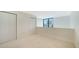 Spacious bedroom with large window and ample closet space at 1558 4Th St # 210, Sarasota, FL 34236