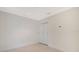 Simple bedroom with carpeted floor and double door closet at 1558 4Th St # 210, Sarasota, FL 34236