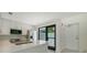 Modern kitchen with stainless steel appliances and white quartz countertops at 1558 4Th St # 210, Sarasota, FL 34236