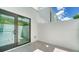 Private patio with tile flooring adjacent to the kitchen at 1558 4Th St # 210, Sarasota, FL 34236