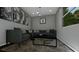 Living room with a gray sectional sofa at 23453 Winthrob Ave, Port Charlotte, FL 33980