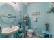 Charming bathroom with light blue walls and coastal decor at 335 Gris Sky Ln, Bradenton, FL 34212