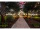 Attractive community entrance with brick pathway and lush landscaping at 335 Gris Sky Ln, Bradenton, FL 34212
