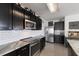 Modern kitchen with stainless steel appliances and white subway tile at 335 Gris Sky Ln, Bradenton, FL 34212