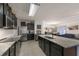 Modern kitchen with granite countertops and stainless steel appliances at 335 Gris Sky Ln, Bradenton, FL 34212