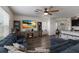 Bright and airy living room features a large sectional sofa and built-in shelving at 335 Gris Sky Ln, Bradenton, FL 34212