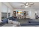 Spacious living room boasts a large sectional sofa and a large flat screen TV at 335 Gris Sky Ln, Bradenton, FL 34212