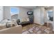 Versatile loft area with a comfortable couch and built-in shelving at 335 Gris Sky Ln, Bradenton, FL 34212