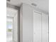 Bedroom featuring a closet with doors and a hallway at 7016 Foxboro Way, Nokomis, FL 34275