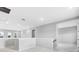 Open hallway with recessed lighting and neutral color scheme at 7016 Foxboro Way, Nokomis, FL 34275