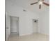 Bright bedroom with tile floors, ceiling fan, and ample closet space at 4244 Central Sarasota Pkwy # 725, Sarasota, FL 34238