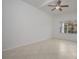 Spacious bedroom with tile flooring, ceiling fan, and large window at 4244 Central Sarasota Pkwy # 725, Sarasota, FL 34238